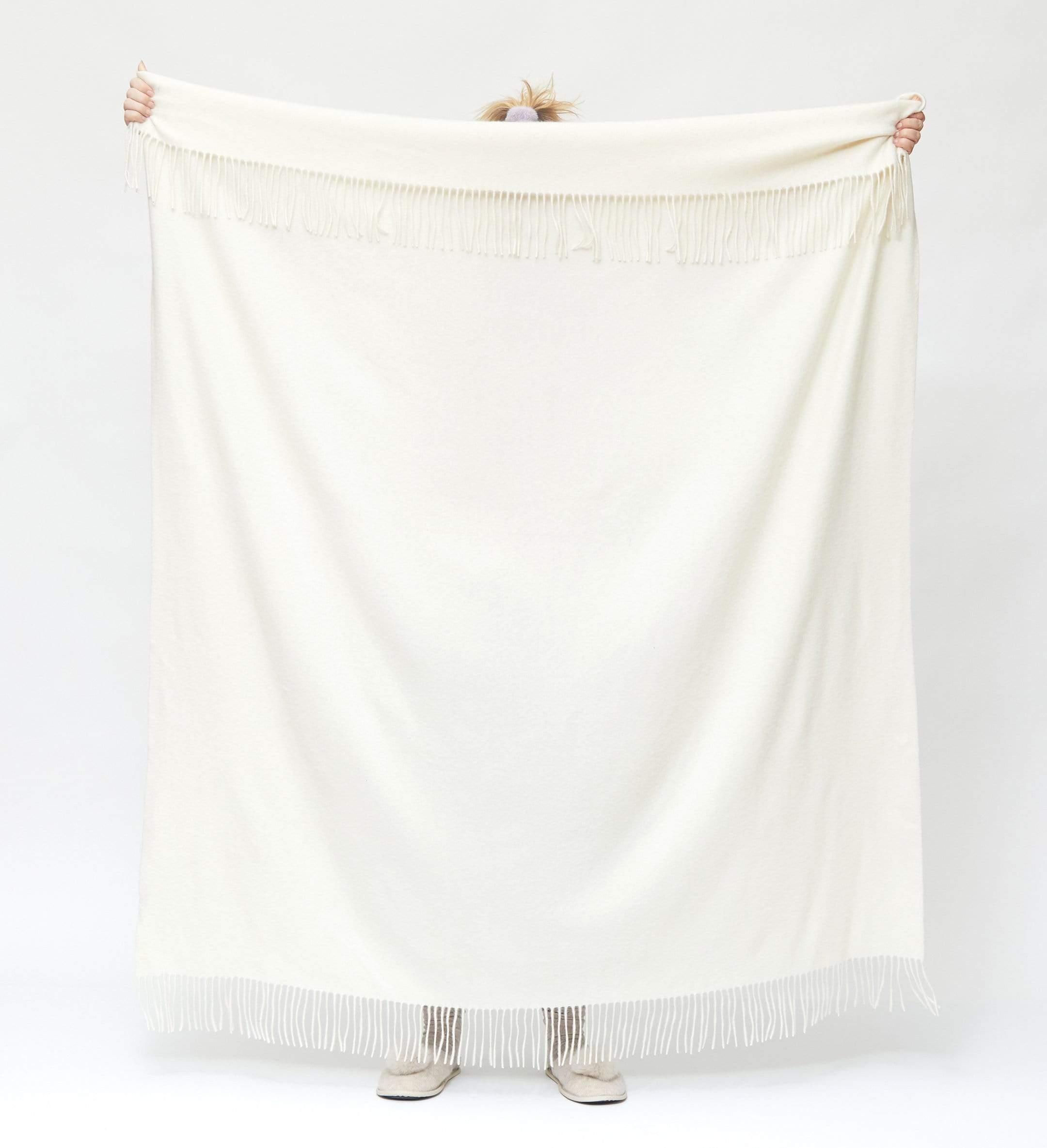 The Solid Cashmere Fringe Throw Blanket